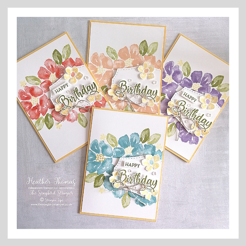 A set of four blossoms in bloom birthday cards
