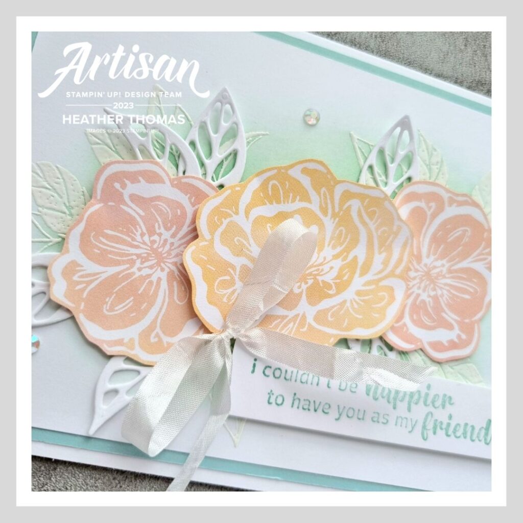 A handmade card using the Irresistible Blooms suite of products, in pinks, yellows and blues