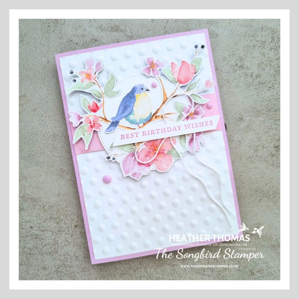 A handmade card made using the flight and airy DSP from Stampin' Up! with a purple base, a white embossed layer and a focal point of a beautiful bird design