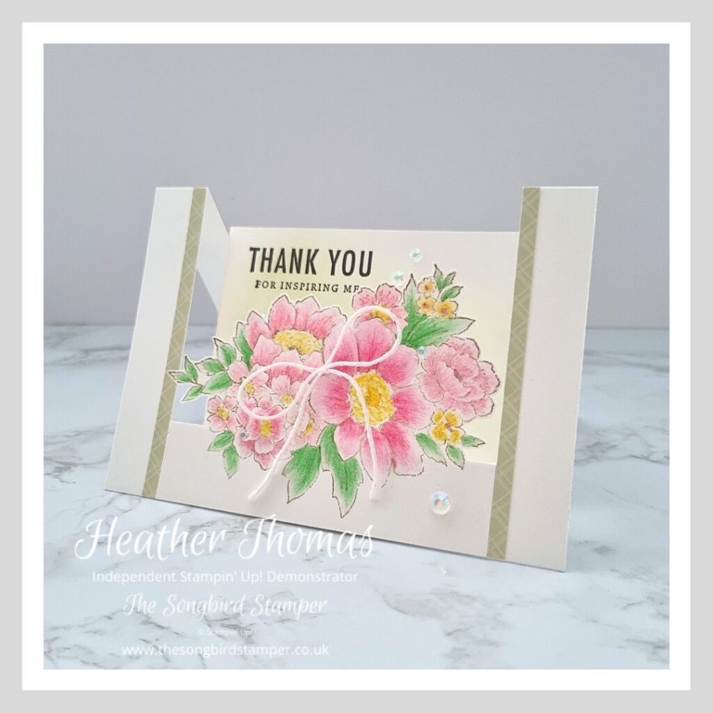 A picture of a handmade Centre Step card with flowers and sparkly gems