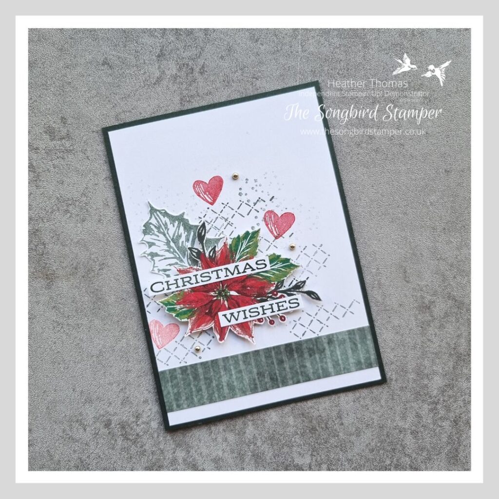 A Christmas card with poinsettia and holly leaf, the starting point for my tutorial on how to step up a simple card.
