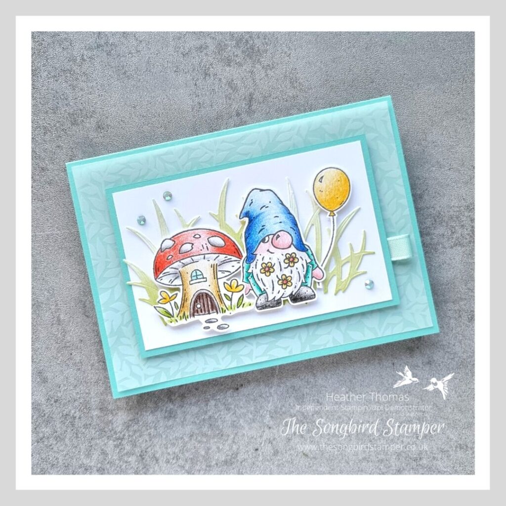 A pencil coloured gnome card in blues and greens, with cute gnome images.