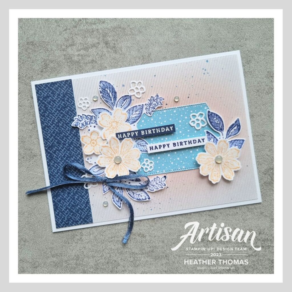 A handmade card with flowers and leaves in blues and pinks, made with the Regency Park Suite of products