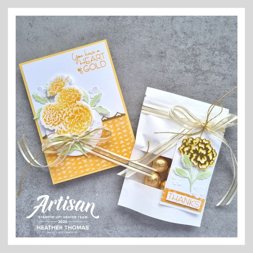 A handmade card and treat holder in yellow and orange, with flowers from the Marigold Moments bundle