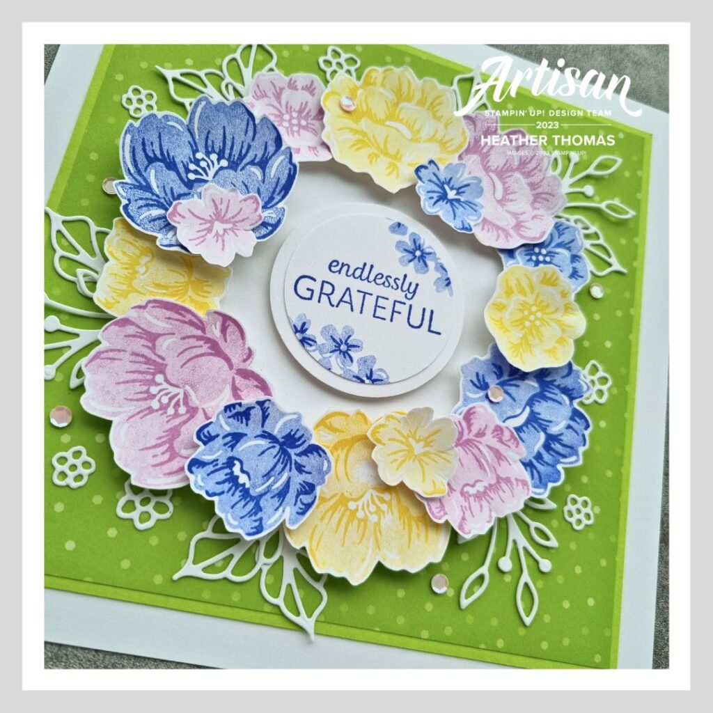 A flower filled box frame in purple, green, yellow, blue and white, all using Stampin' Up! supplies