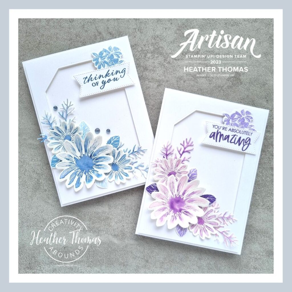 A handmade card in purple and one in blue with watercoloured flowers and the words 'You're absolutely amazing'