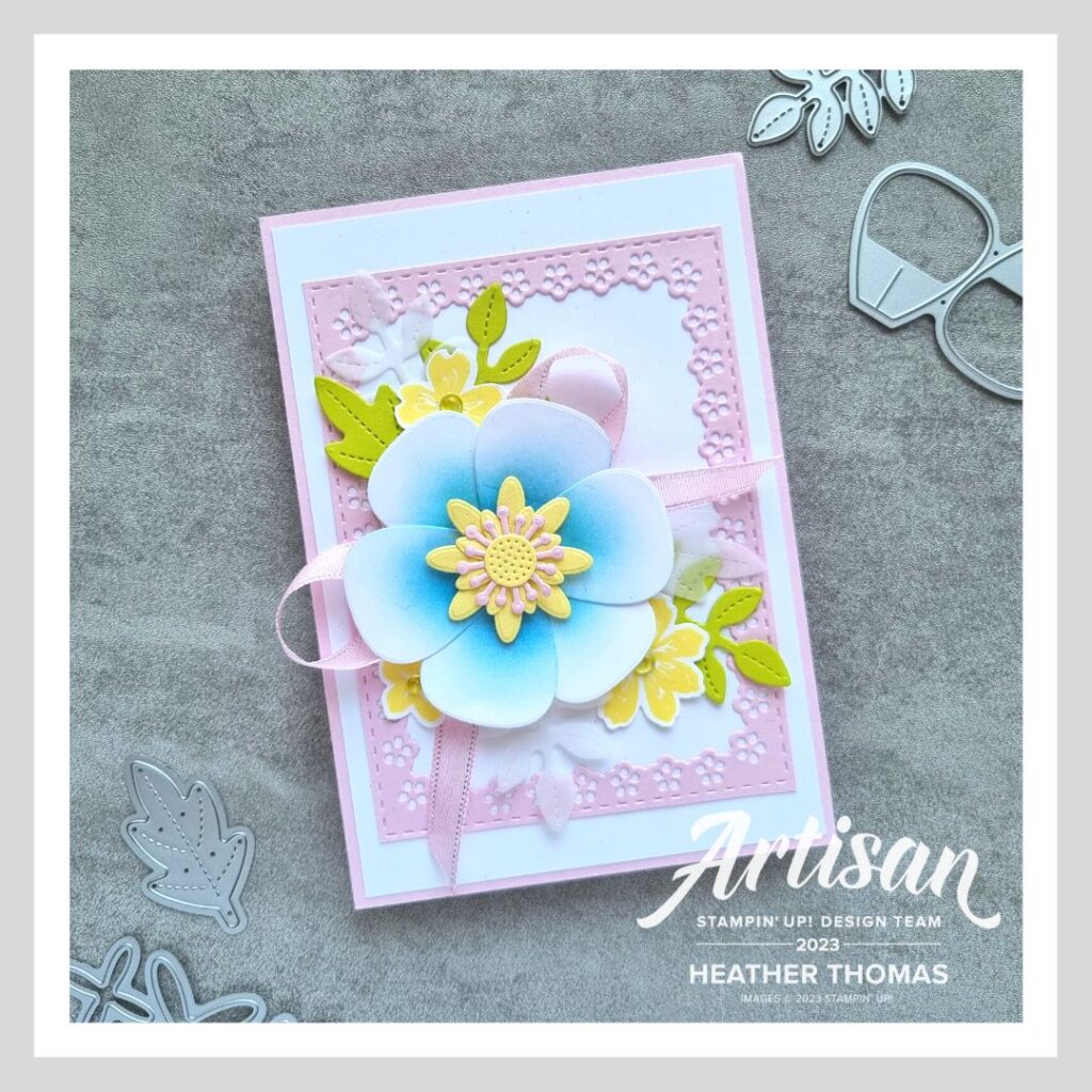 A handmade easel card in fresh spring colours with a large flower made using the paper florist dies from Stampin' Up!