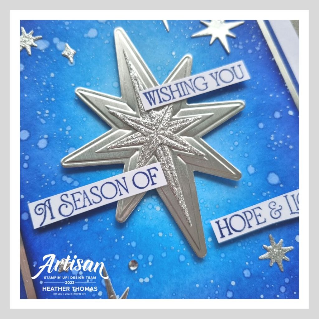 A handmade card with a beautiful blended background in blue with a silver star and the words 'Wishing you a season of hope and light'