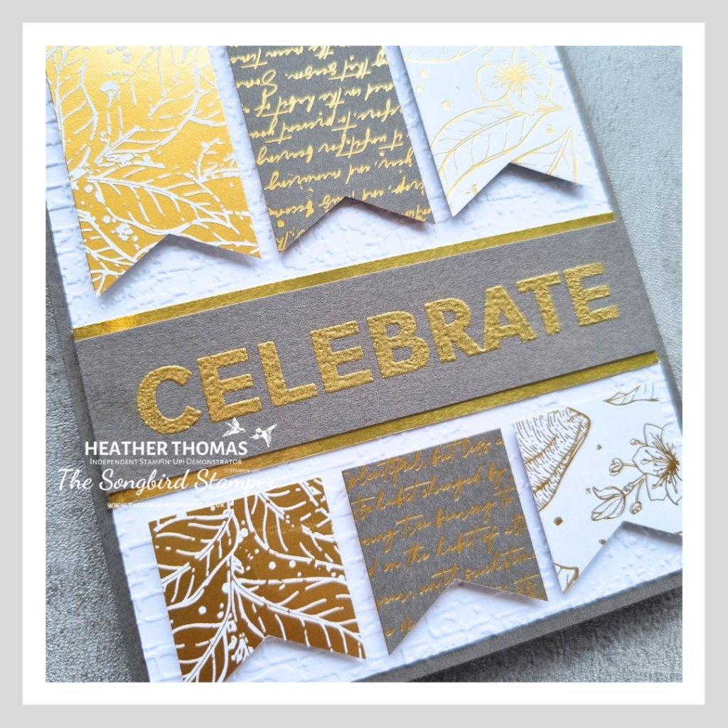 a close up of An easy Father's Day card in grey, gold and white, with three strips of paper and a gold heat embossed greeting saying CELEBRATE