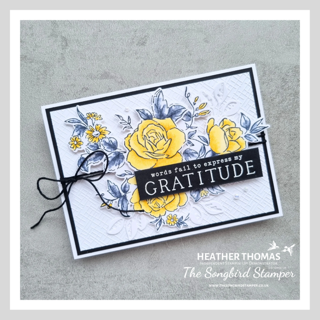 A handmade card using only three colours of the colour challenge, white, black and Daffodil Delight yellow, with flowers and leaves and the sentiment Words fail to express my gratitude