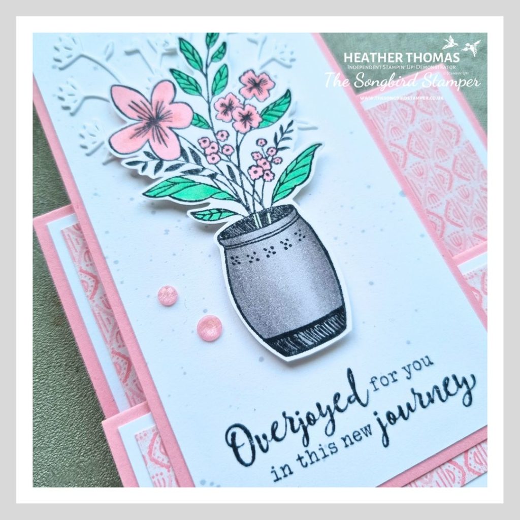 A close up of a handmade faux stepper card using the new 2024-2026 In Colors from Stampin' Up! with a vase full of flowers and the words 'overjoyed for you in this new journey'.